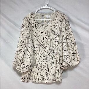 Elegant Cream Blouse with Black Abstract Design